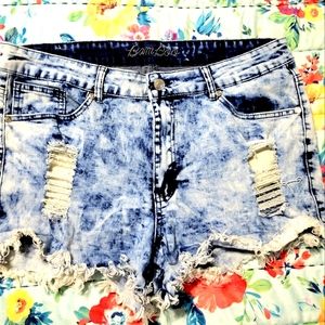 Stylish shorts with rips & frayed bottom. Size 16. Bamboo boutique bought.